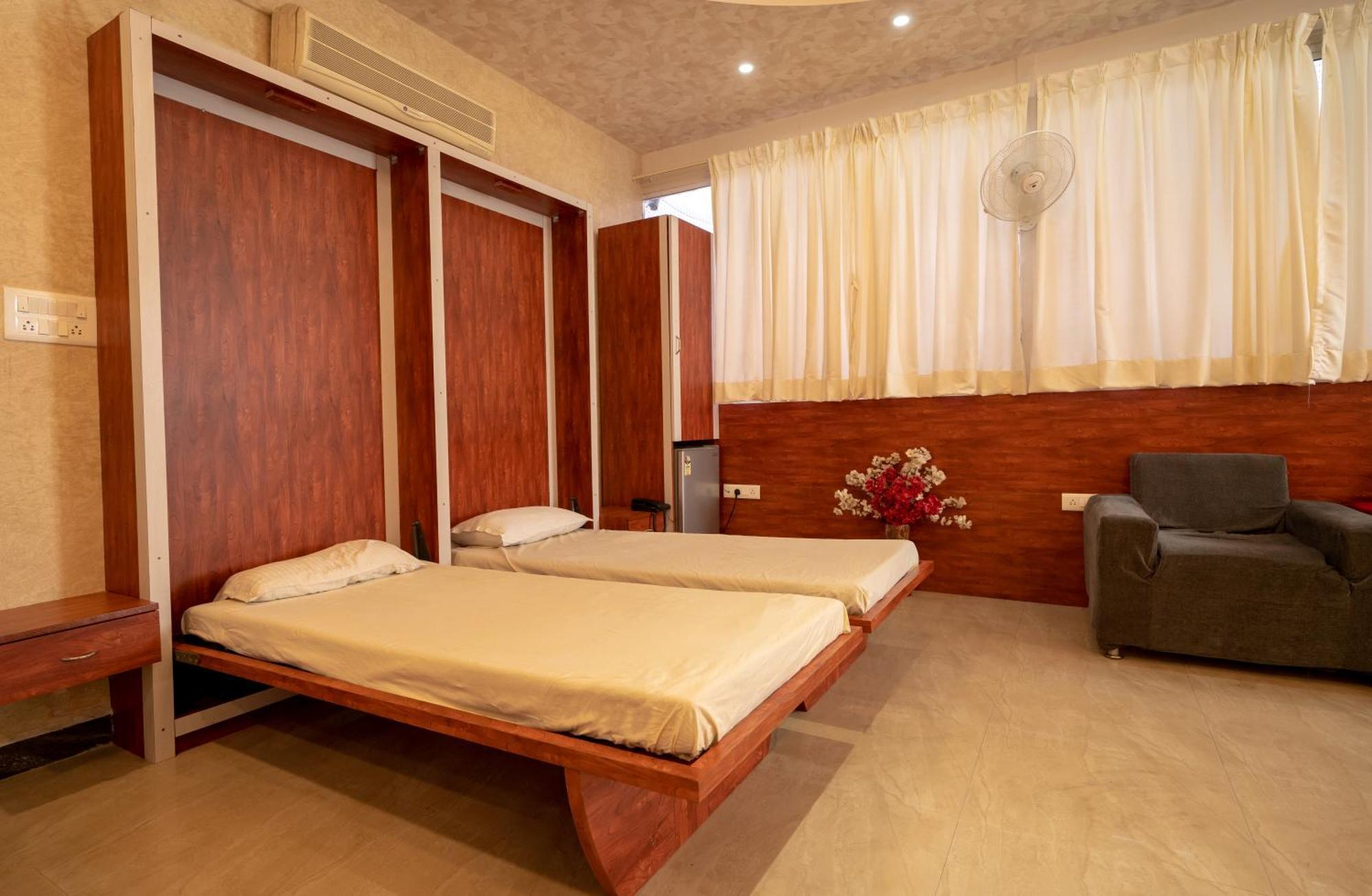 Seasons Suites Koramangala Бенґалуру Номер фото